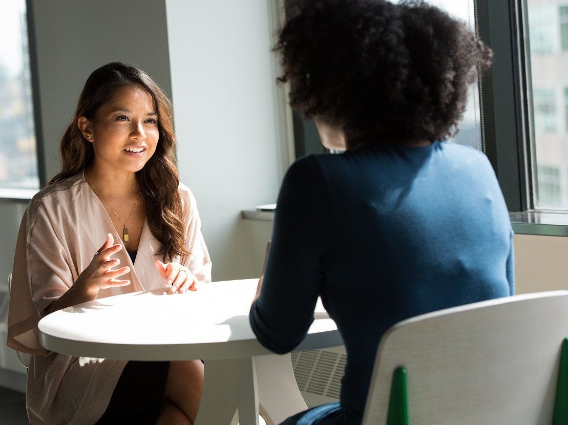 A person talking to another person